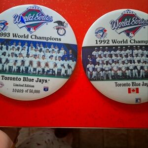 A pair of Toronto Blue Jays world series championship buttons